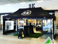 Zwarte 3x6 vouwtent gepersonaliseerd voor 9K Gent.