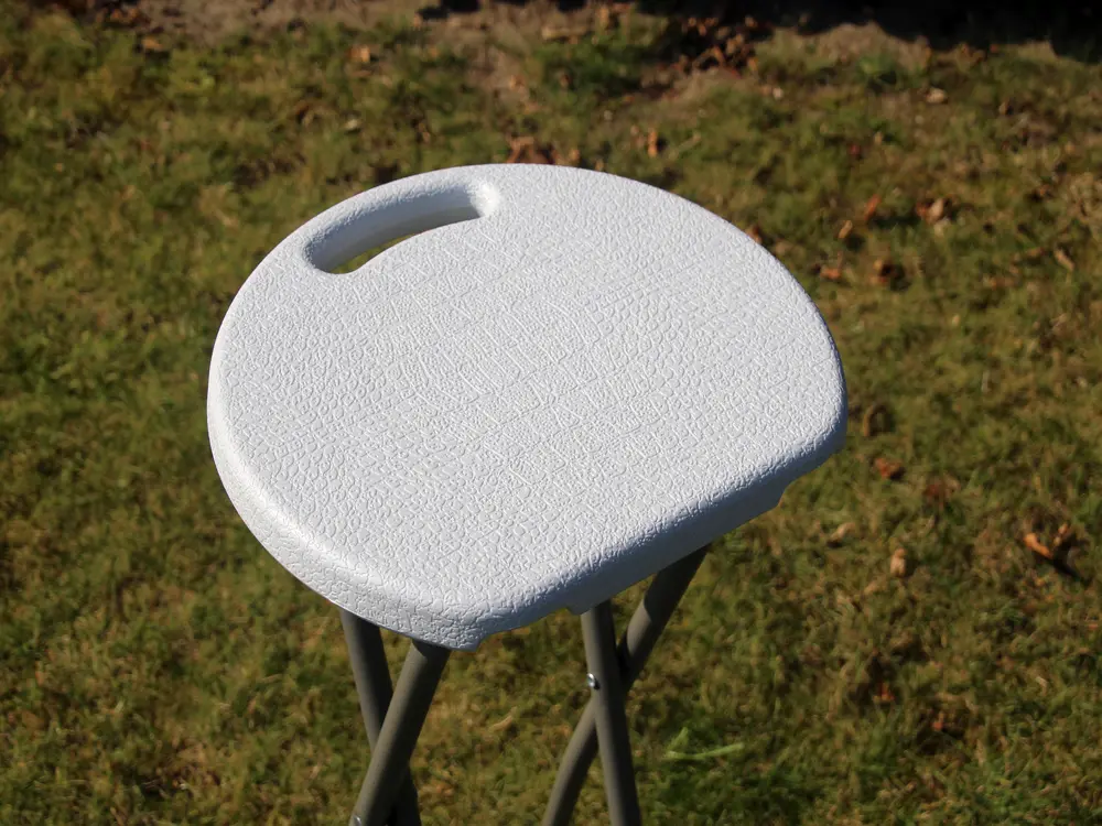 Inklapbare kruk met kunststof zitvlak